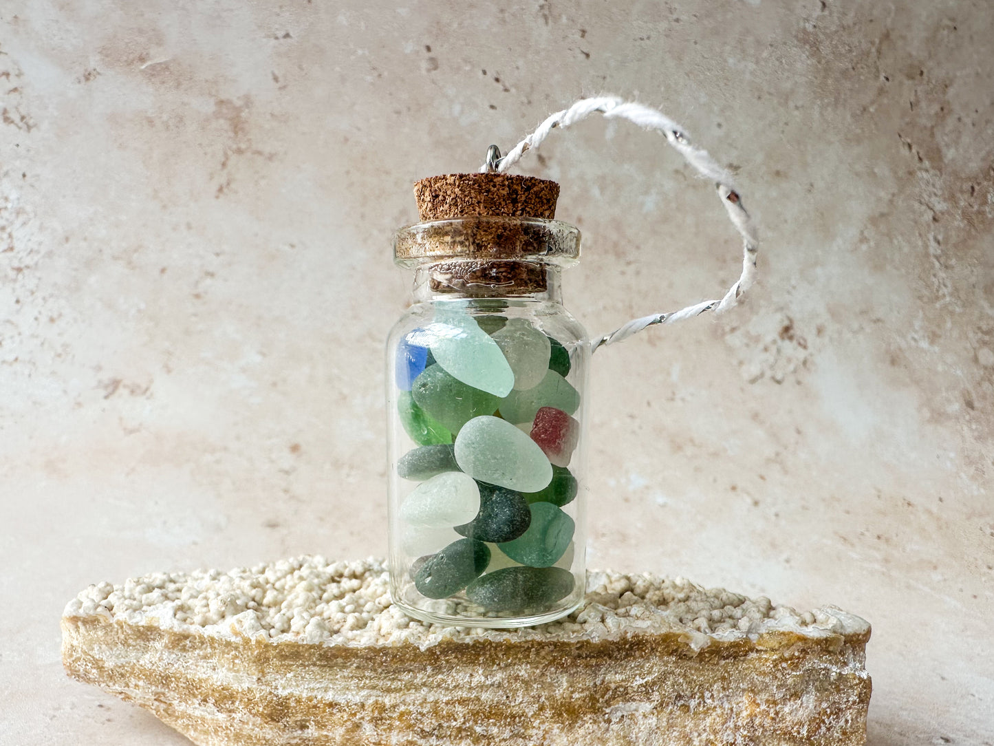 Sea glass in a bottle ornament