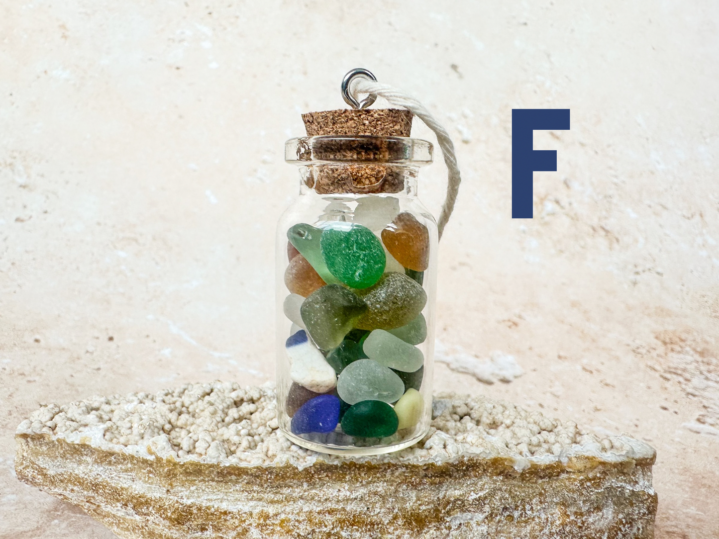 Sea glass in a bottle ornament