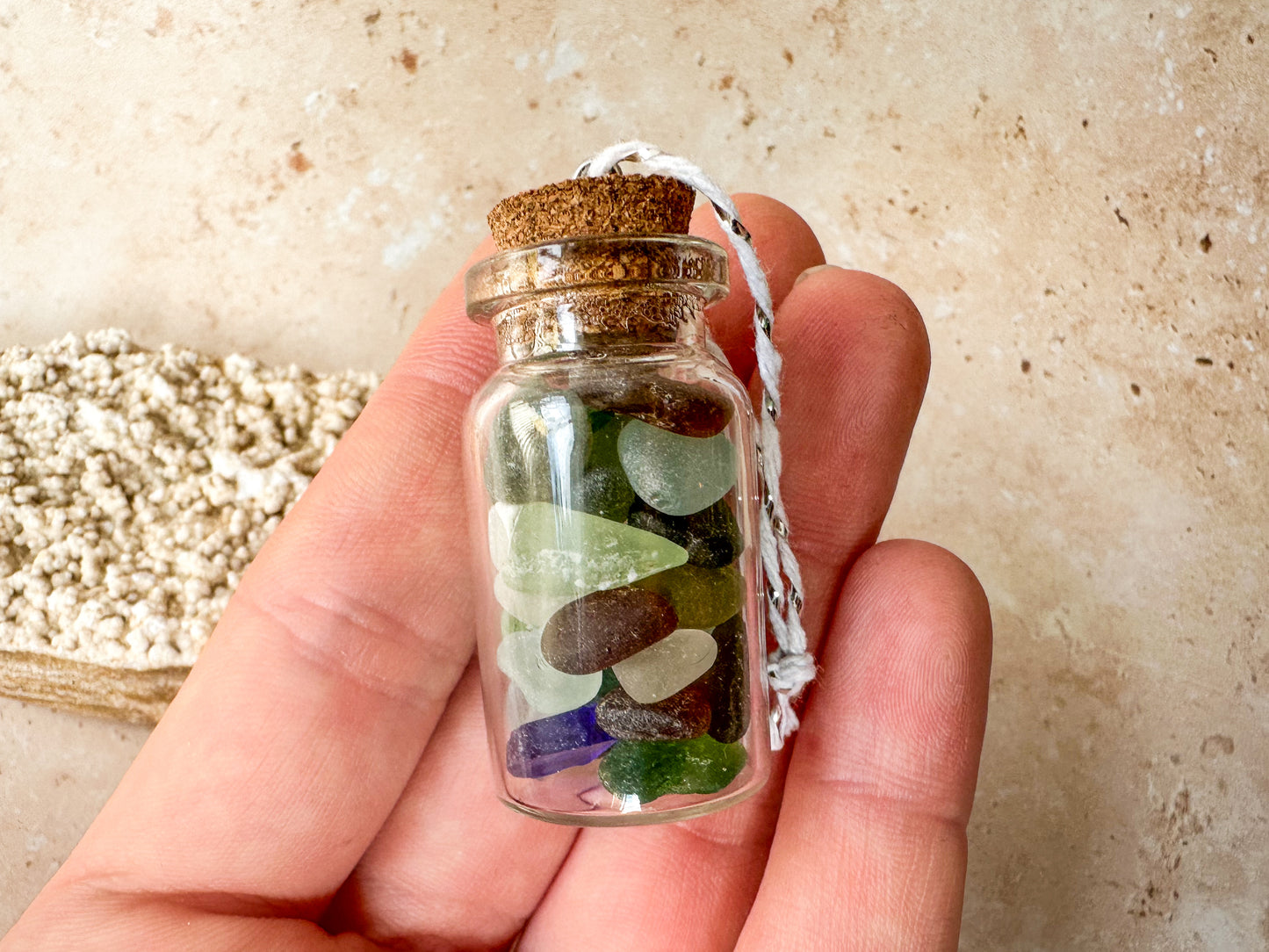 Sea glass in a bottle ornament