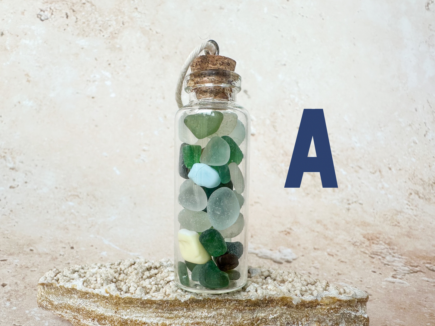 Sea glass in a bottle ornament