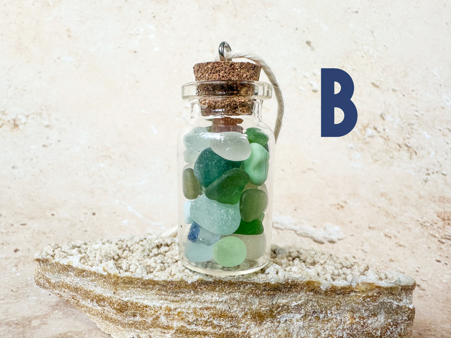 Sea glass in a bottle ornament