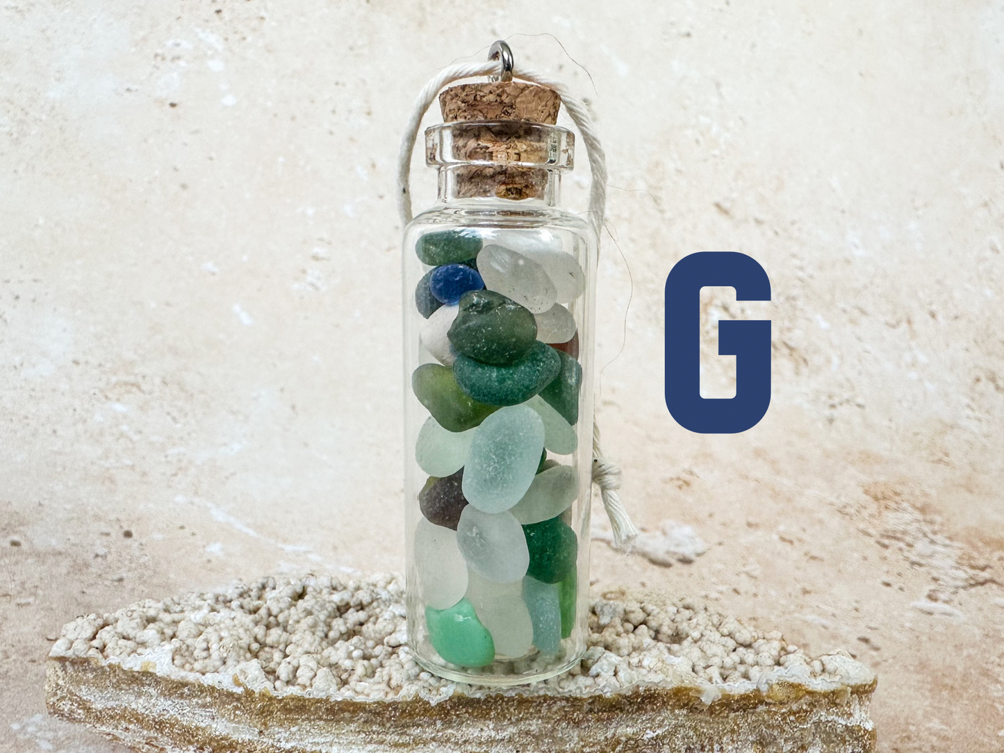 Sea glass in a bottle ornament