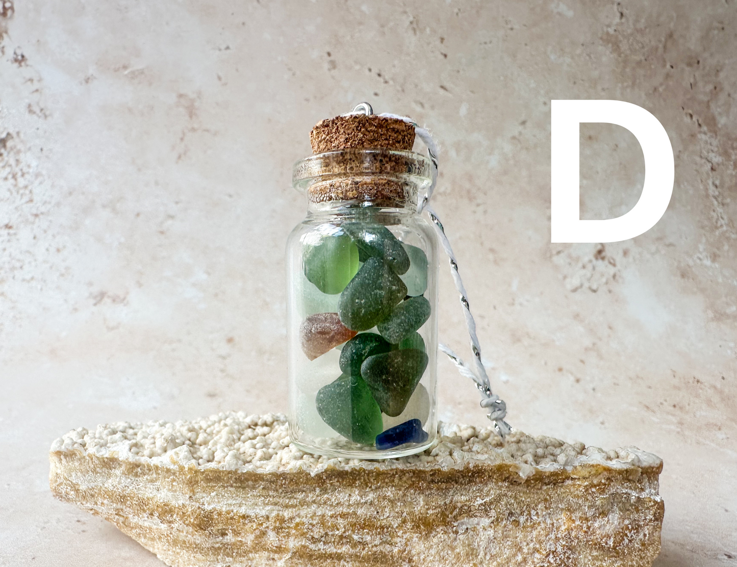 Sea glass in a bottle ornament