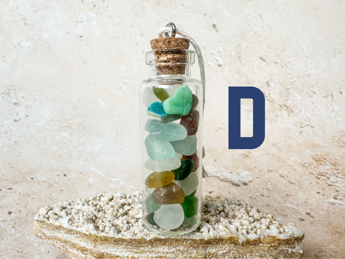 Sea glass in a bottle ornament