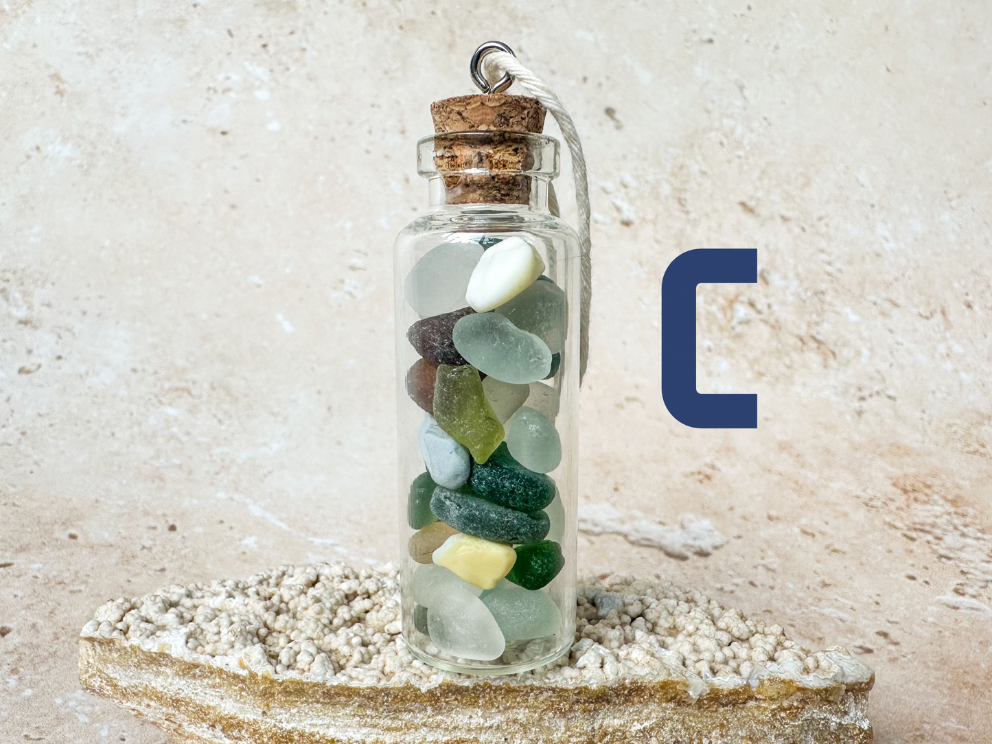 Sea glass in a bottle ornament