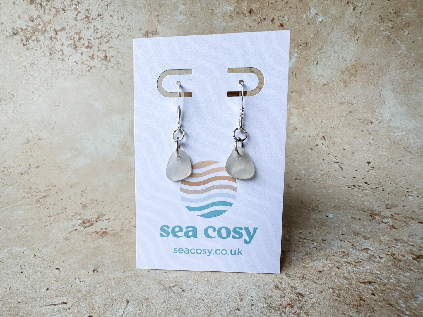 White dangly sea glass earrings