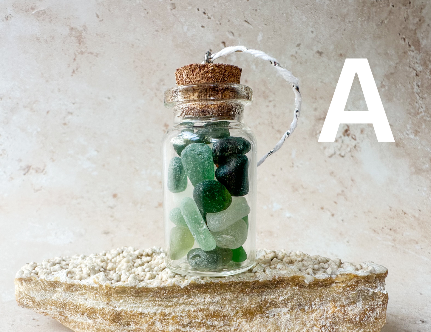 Sea glass in a bottle ornament