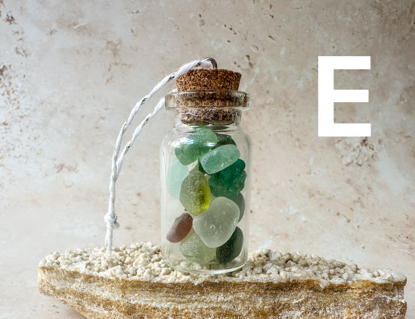 Sea glass in a bottle ornament