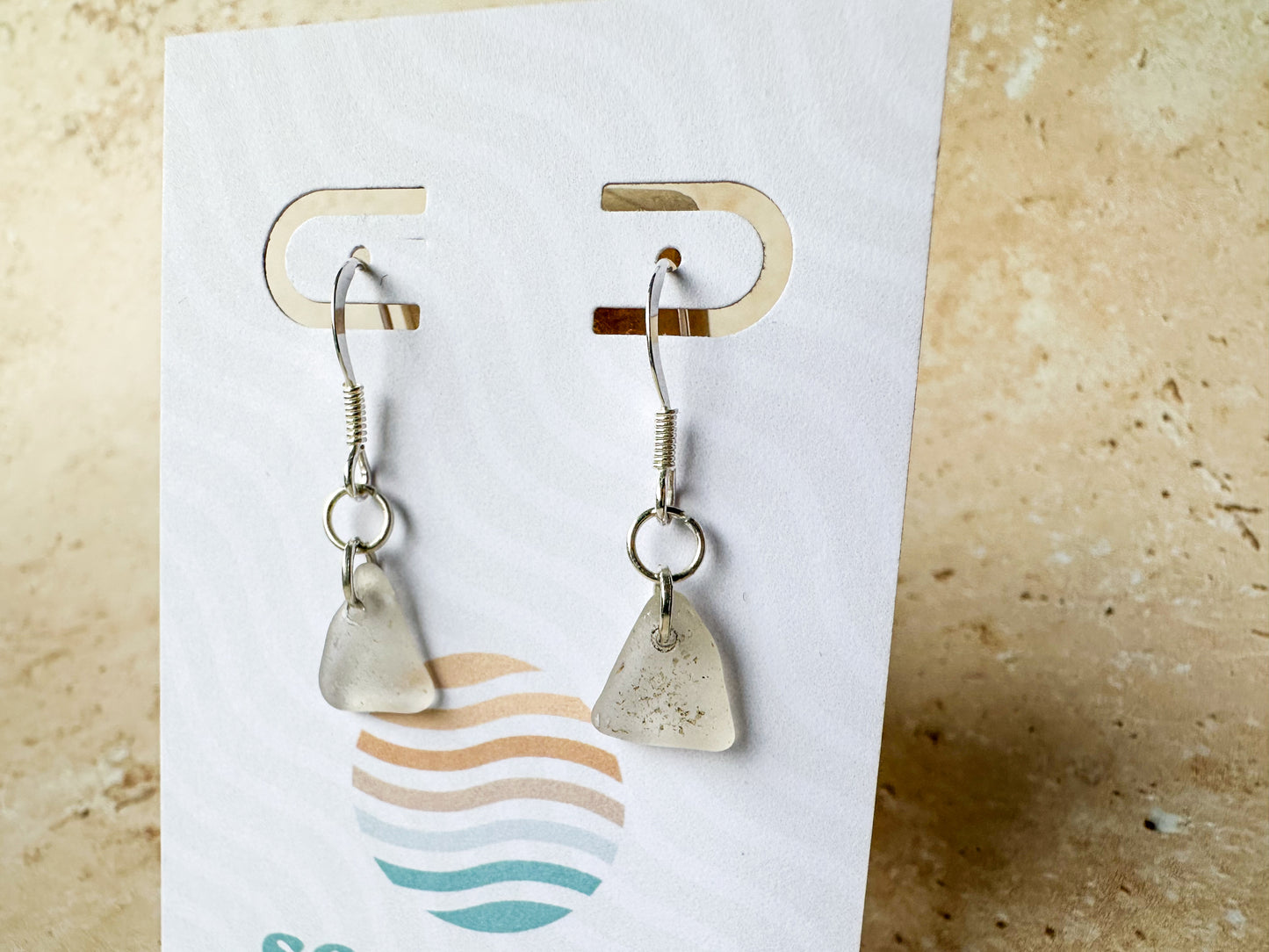 White dangly sea glass earrings