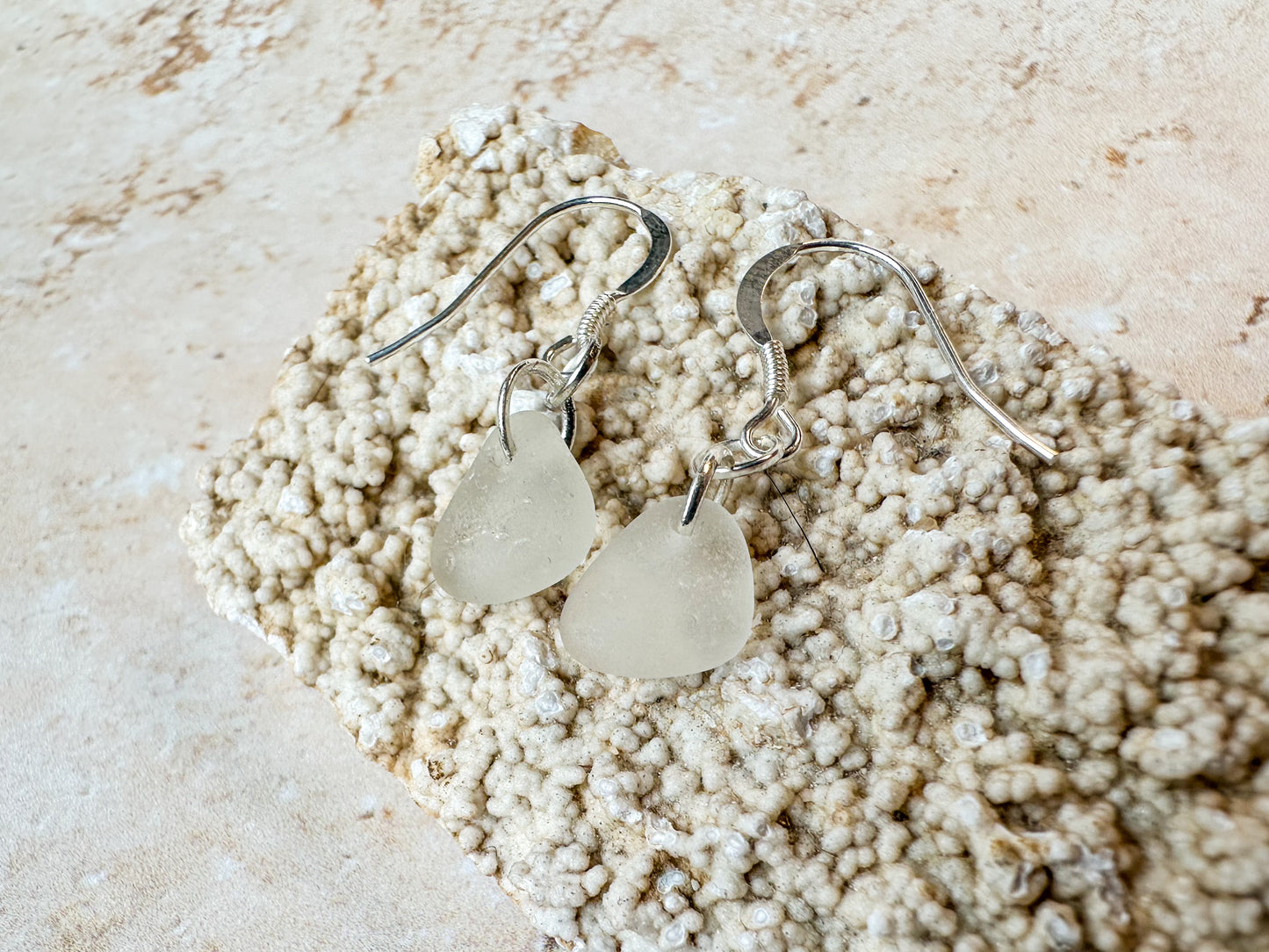 White dangly sea glass earrings