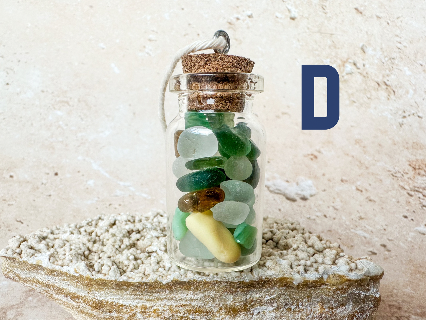 Sea glass in a bottle ornament