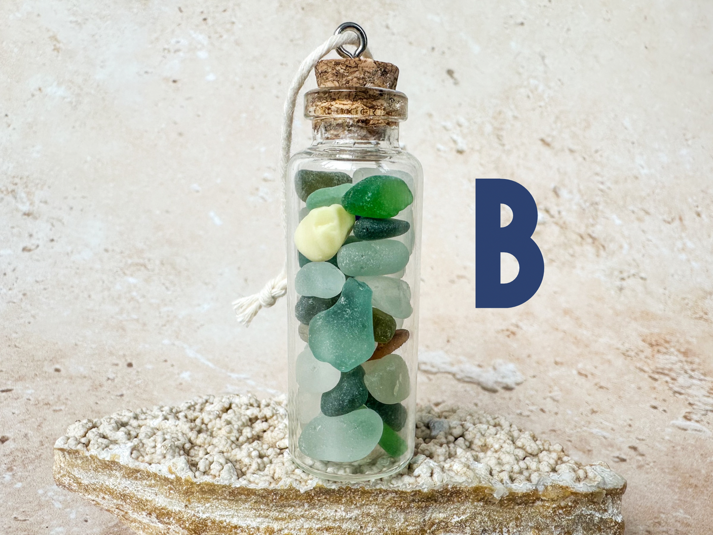 Sea glass in a bottle ornament