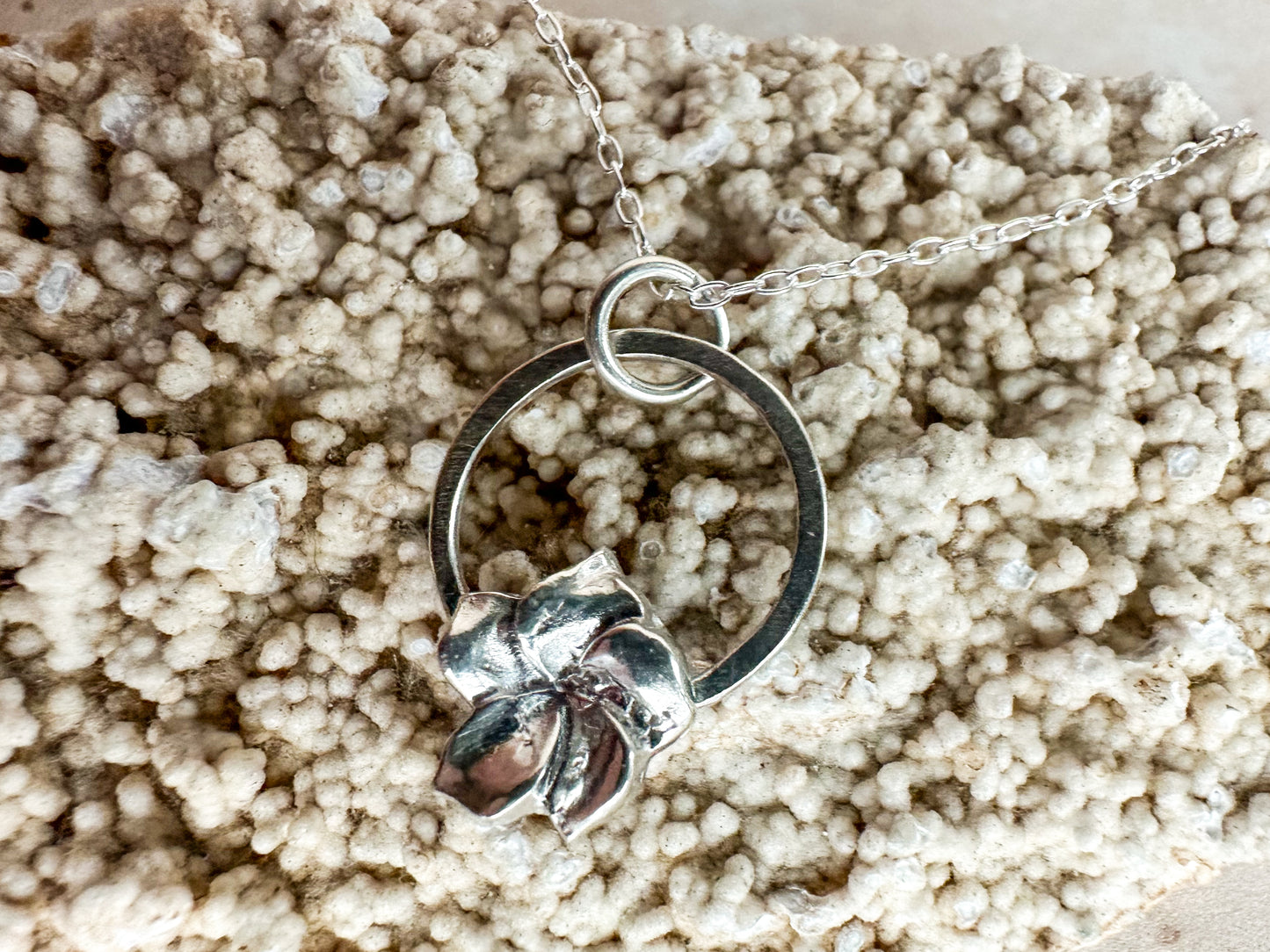 Fine and sterling silver hibiscus pendant necklace