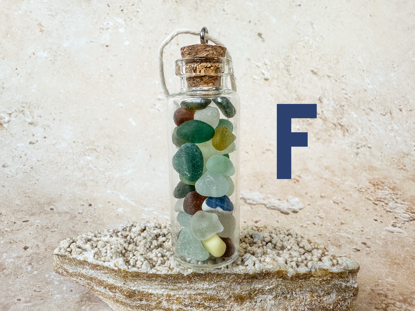 Sea glass in a bottle ornament