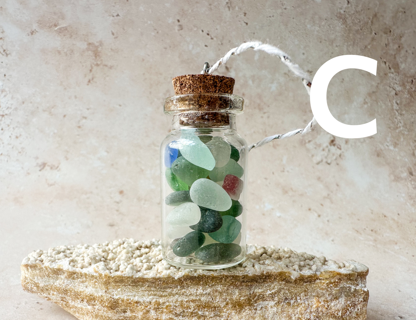 Sea glass in a bottle ornament