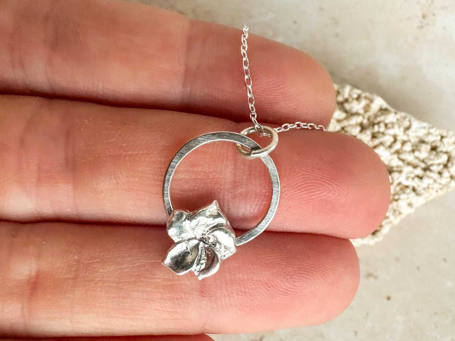 Fine and sterling silver hibiscus pendant necklace