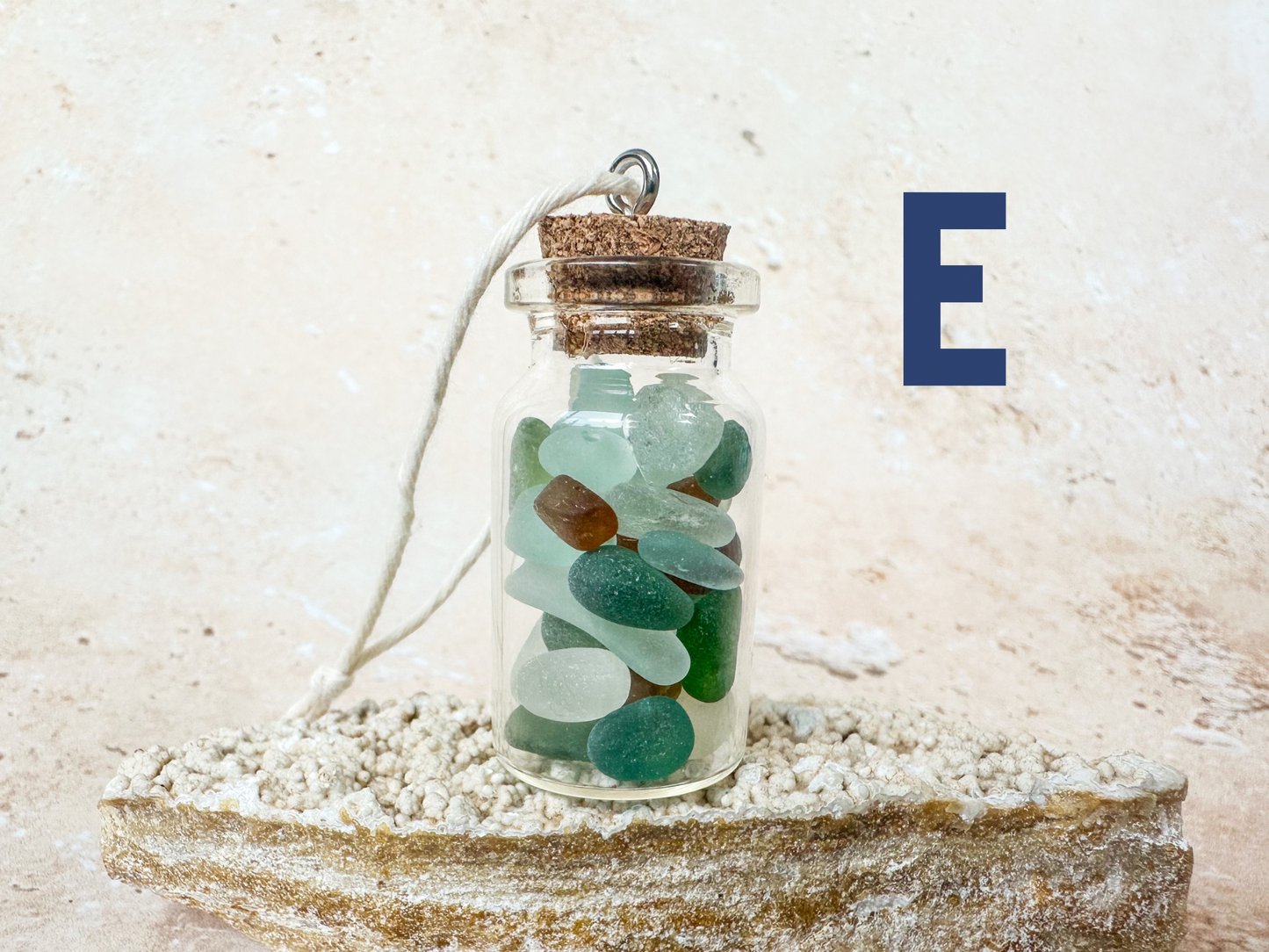 Sea glass in a bottle ornament